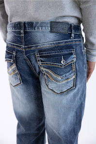 Back view of men's dark wash loose straight-leg denim jeans featuring embellished flap back pockets with contrast stitching and a branded leather waistband patch.