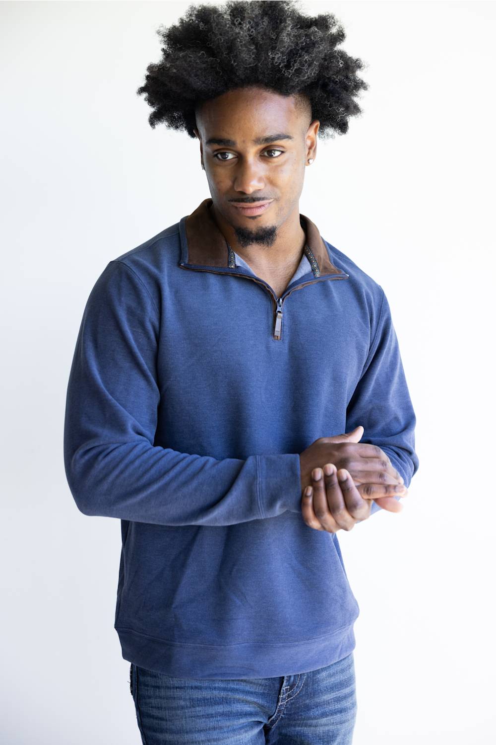 Butter soft, zipneck sweater with brown zipper and collar accents 
