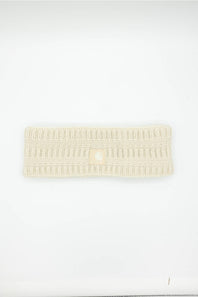 SATIN LINED CARHARTT HEADBAND LAID ON A WHITE BACKGROUND