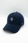 A navy blue corduroy baseball cap featuring a white embroidered New York Yankees logo on the front and a white '47' brand logo on the side, set against a clean white background.