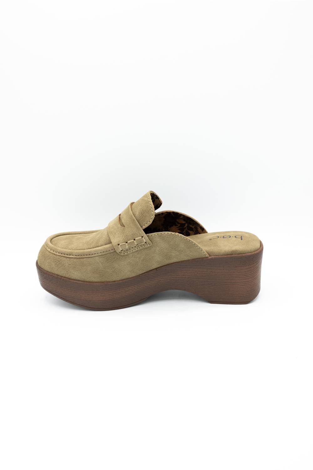 A single taupe suede platform mule shoe with a brown wedge heel, shown from a side profile view on a white background.