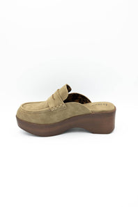 A single taupe suede platform mule shoe with a brown wedge heel, shown from a side profile view on a white background.