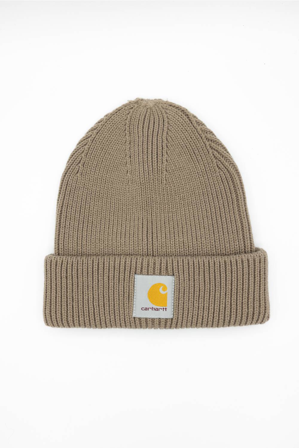 Carhartt Cuffed Rib Knit Beanie in stone brown laid flat against a neutral background, featuring the classic Carhartt logo patch on the folded cuff.