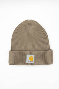 Carhartt Cuffed Rib Knit Beanie in stone brown laid flat against a neutral background, featuring the classic Carhartt logo patch on the folded cuff.
