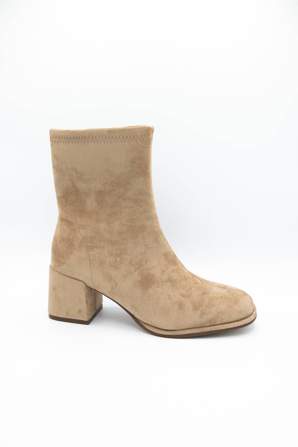 A beige suede ankle boot with a chunky block heel, shown from a side profile on a white background.