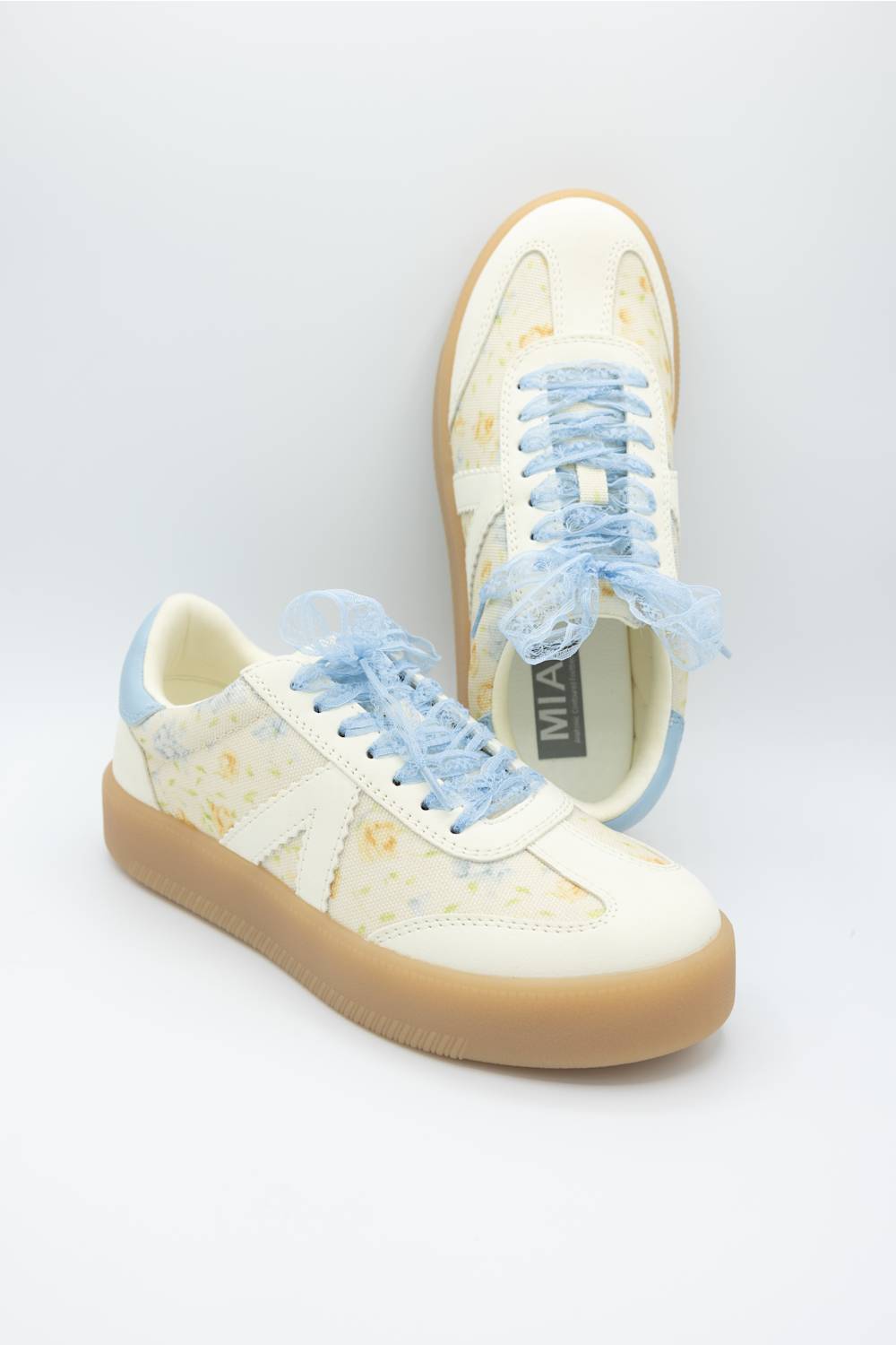 MIA Axel Sneakers for Women in Blue Floral; Pair of sneakers with light blue laces on a white background