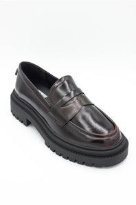MIA Henrik Platform Loafers in wine red leather, featuring a chunky lug sole, round moc toe, and classic penny loafer strap detail, displayed against a plain white background.