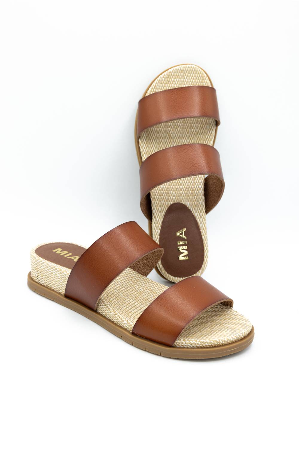 MIA Yelena Slide Sandals for Women in Cognac; Brown sandals with woven design on a white background