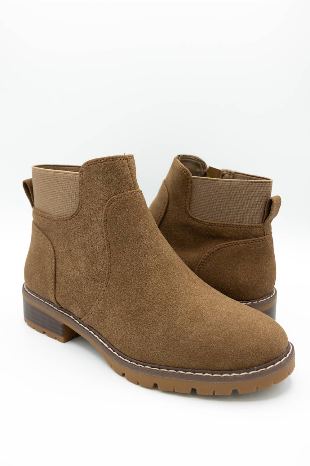 A pair of women's brown suede Chelsea-style ankle boots with elastic side panels and low block heels, shown on a clean white background.