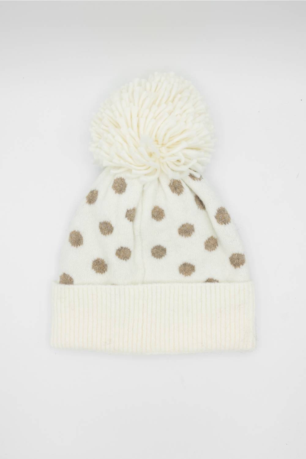 cream and brown polka dot beanie on a white background 
