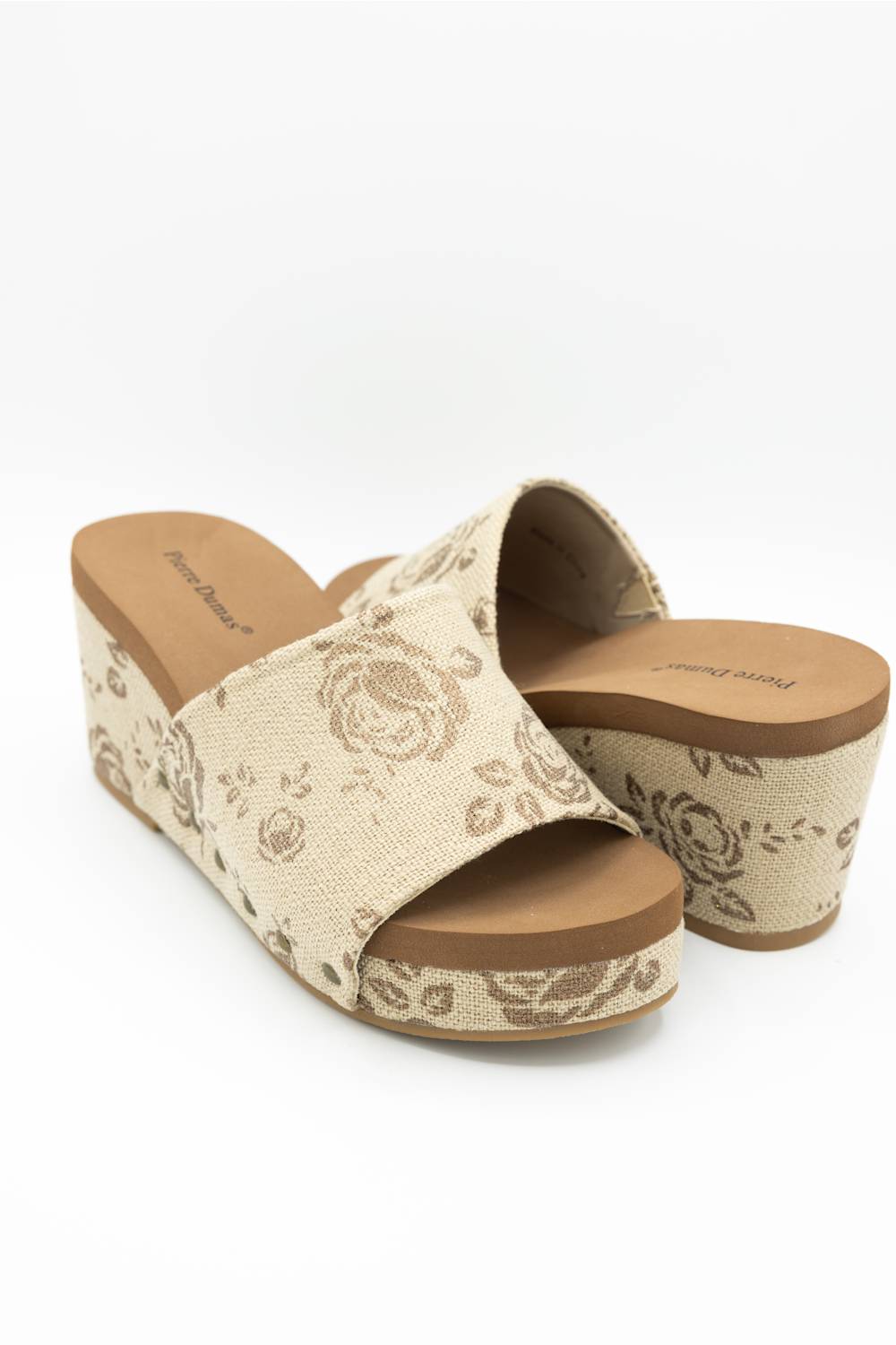 Pierre Dumas Vivian Floral Wedge Sandals for Women in Bronze; Beige floral-patterned wedge sandals on a white background