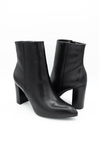 A pair of black leather ankle boots with block heels and pointed toes, shown on a clean white background.