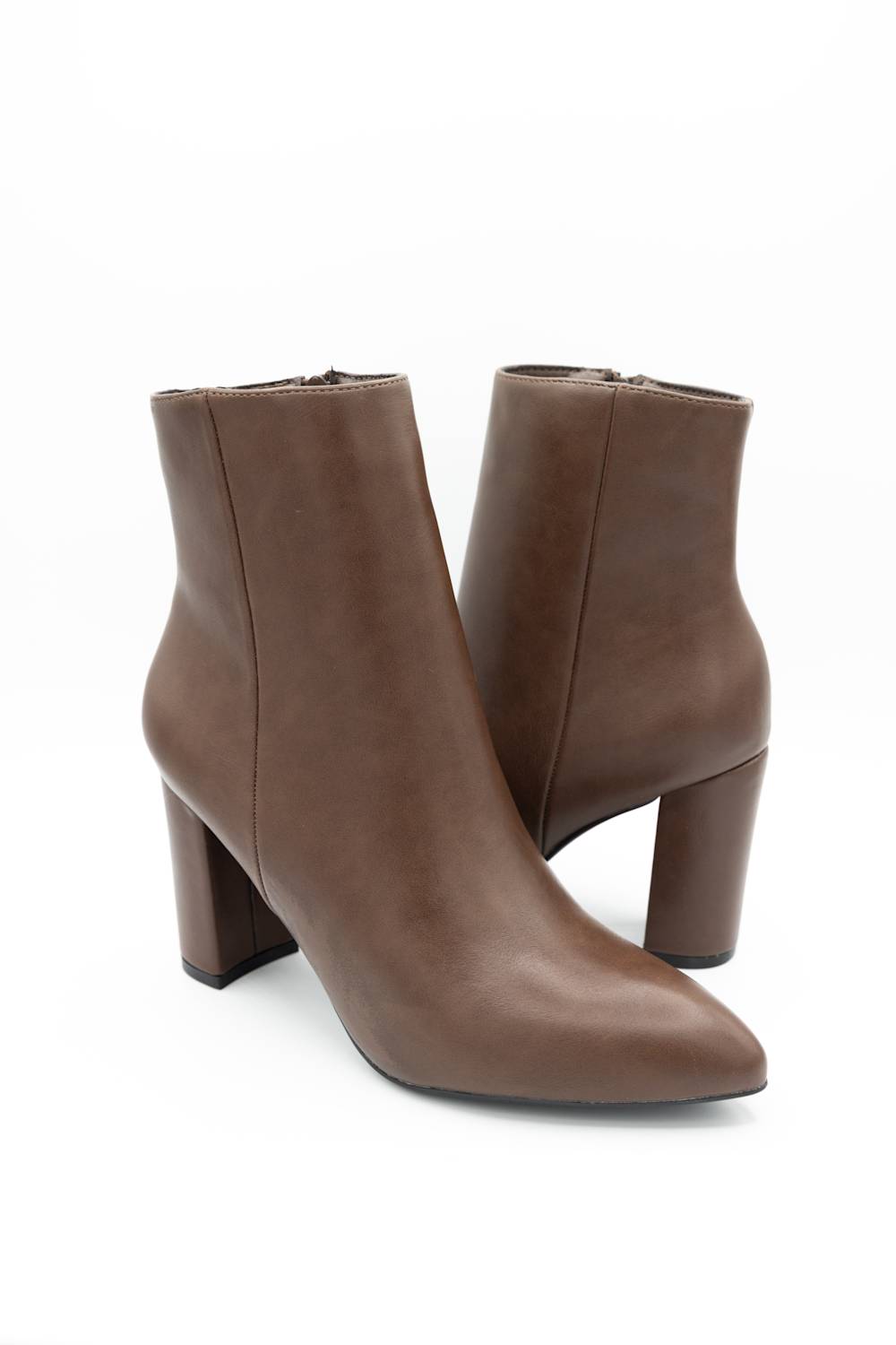 A pair of women's brown leather ankle boots with a pointed toe and a chunky block heel, shown against a plain white background.