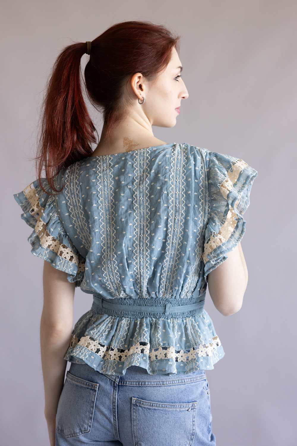 Embroidered Flutter Sleeve Peplum Top for Women in Chambray