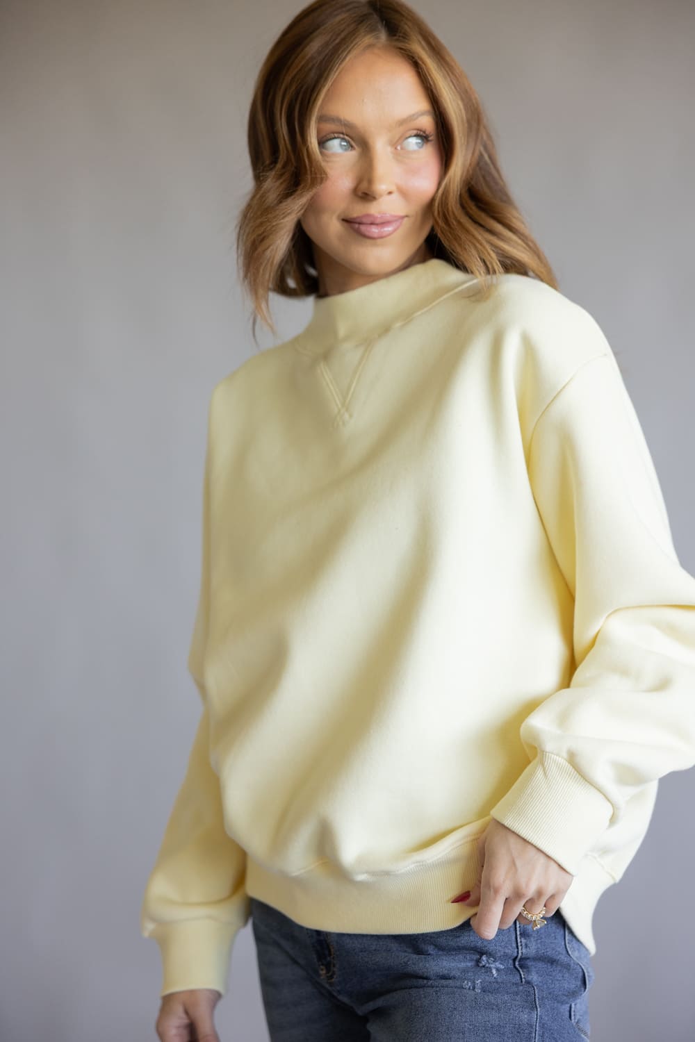 Things Between Mock Neck Fleece Pullover for Women in Butter Yellow
