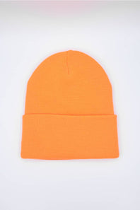 back of a neon orange Carhartt beanie