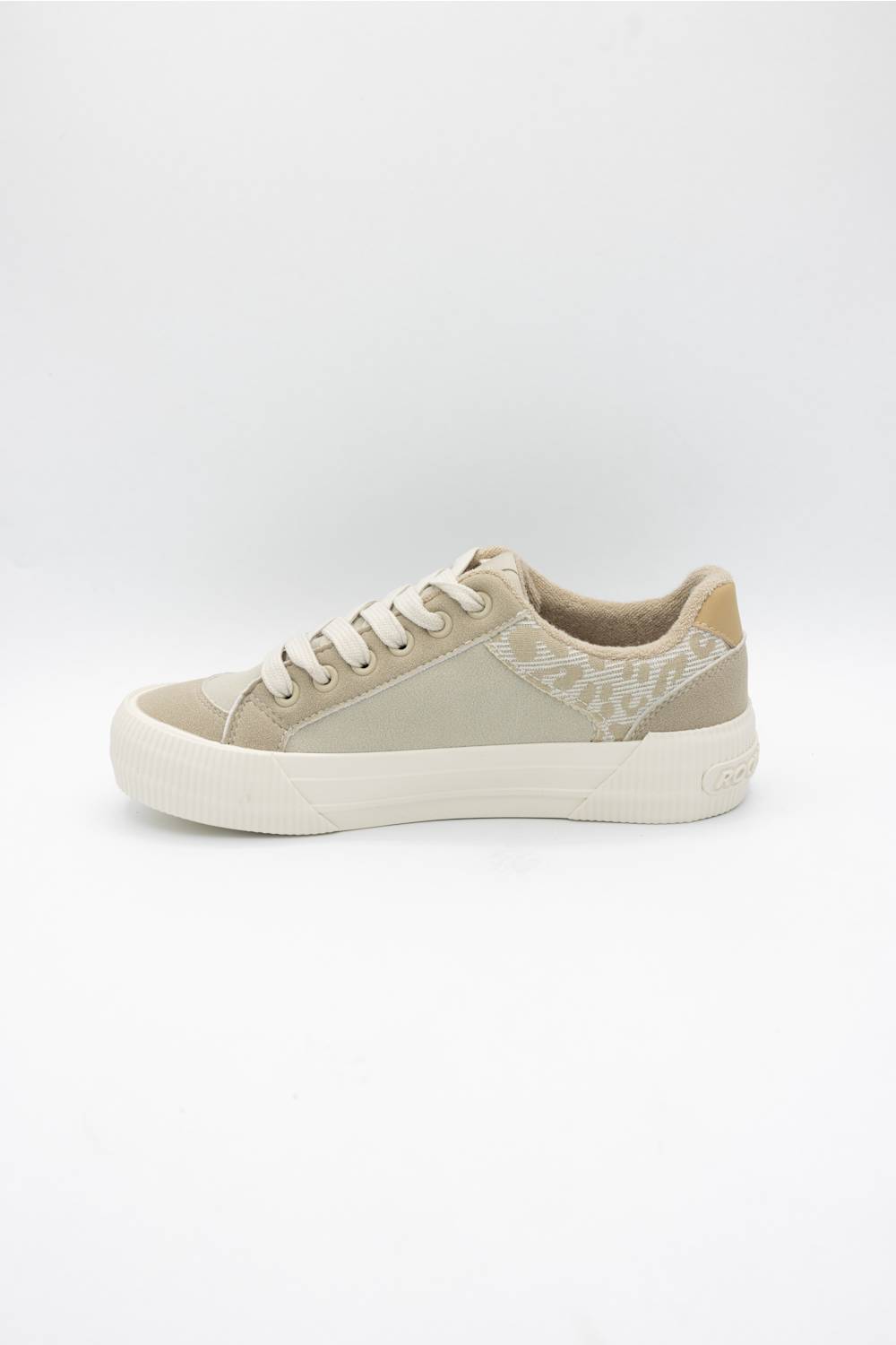A low-top sneaker in beige and off-white, featuring a textured patterned side panel, beige laces, and a thick white platform sole, shown against a plain light gray background.
