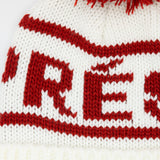C.C. Apres Ski Yarn Pom Beanie for Women in Ivory/Red