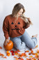 1897 Active Embroidered Pumpkin Face Sweatshirt for Women in Rust
