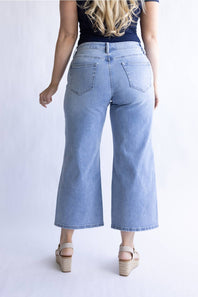 Mica Mid Rise Wide Crop Jeans for Women; Person wearing light blue jeans on a plain background