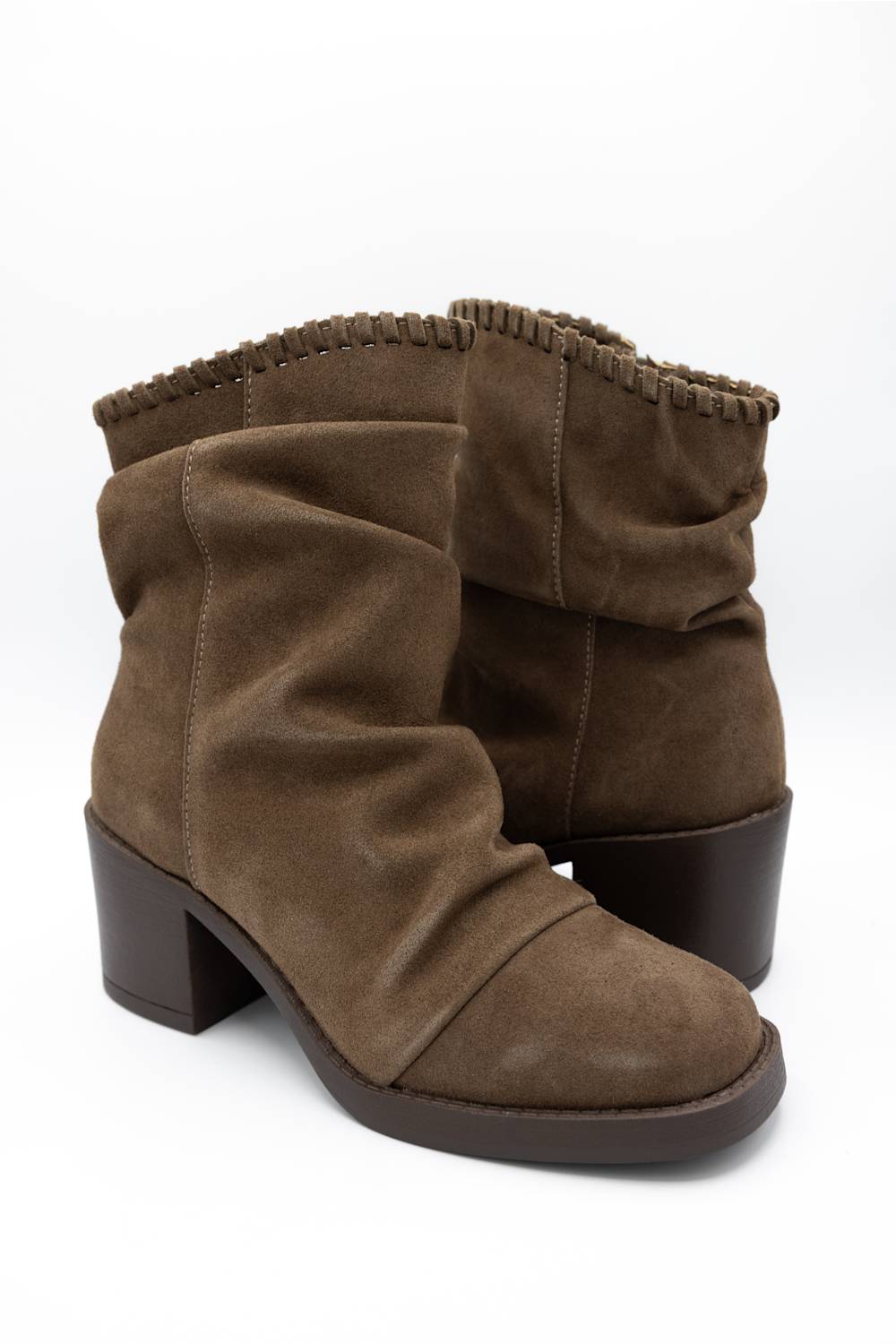 A pair of women's brown suede slouchy ankle boots with a low block heel and a decorative braided trim along the top collar, shown against a plain white background.