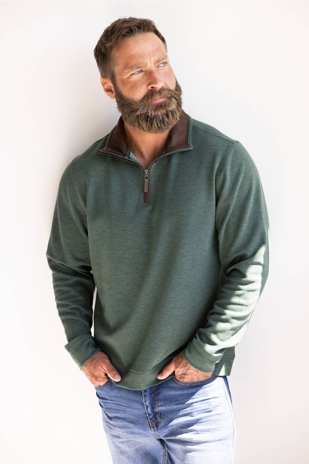 Buttery soft, zipneck pullover with brown zipper and collar accents 