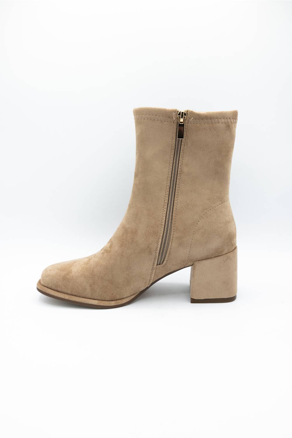 A beige suede ankle boot with a block heel and a side zipper, shown from a side profile view on a white background.