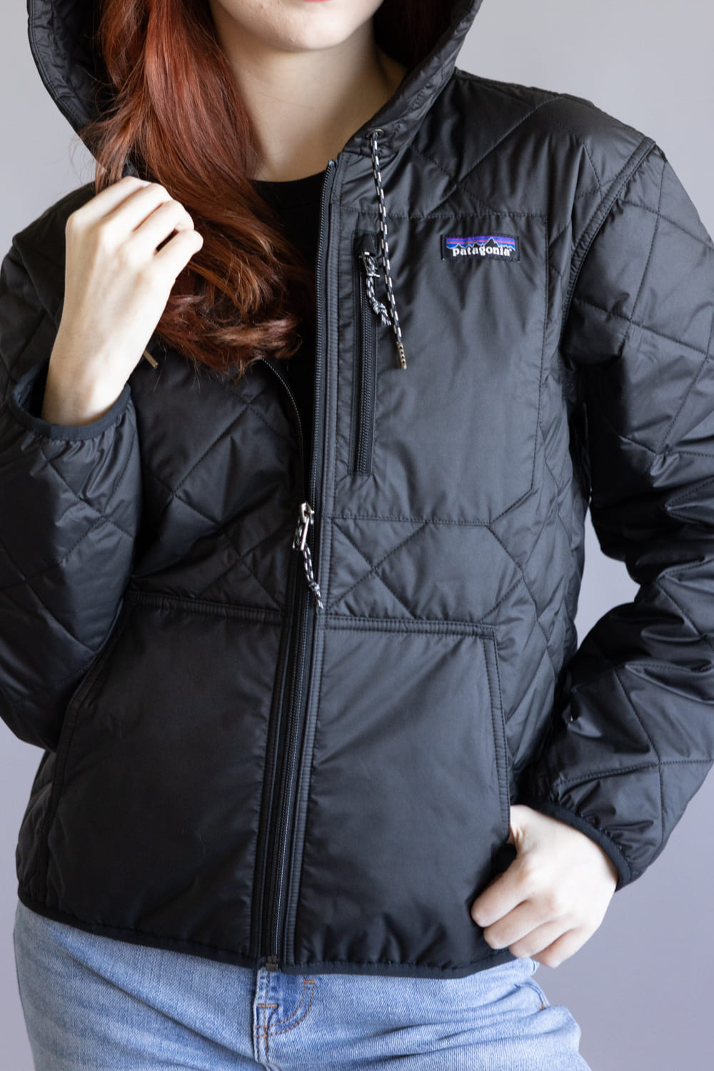 Patagonia Women’s Diamond Quilted Bomber Hoodie Jacket in Black