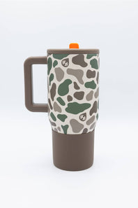 A travel mug with a brown handle and base, featuring a beige upper body covered in a green and brown camouflage pattern. It has a matching brown lid with a small orange accent tab.