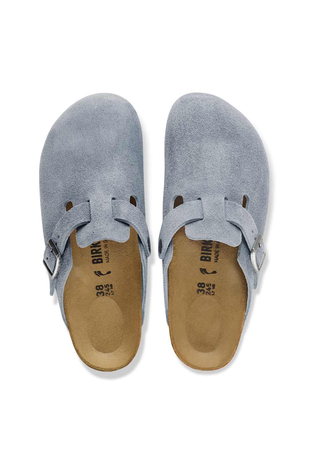 A pair of Birkenstock Birkas slip-on clogs in light blue suede, shown from a top-down view on a white background.