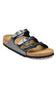 A pair of black leather slide sandals with double adjustable buckles, a cork midsole, and a black outsole, shown on a plain white background.