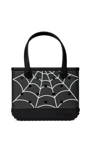 A black Bogg handbag featuring a white spiderweb pattern across the front, with black handles and a black base, shown on a plain white background.