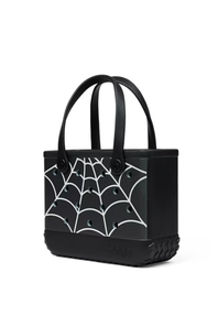 A black tote bag with a white spiderweb pattern on the front, featuring dual top handles and a textured bottom base, shown against a plain white background.
