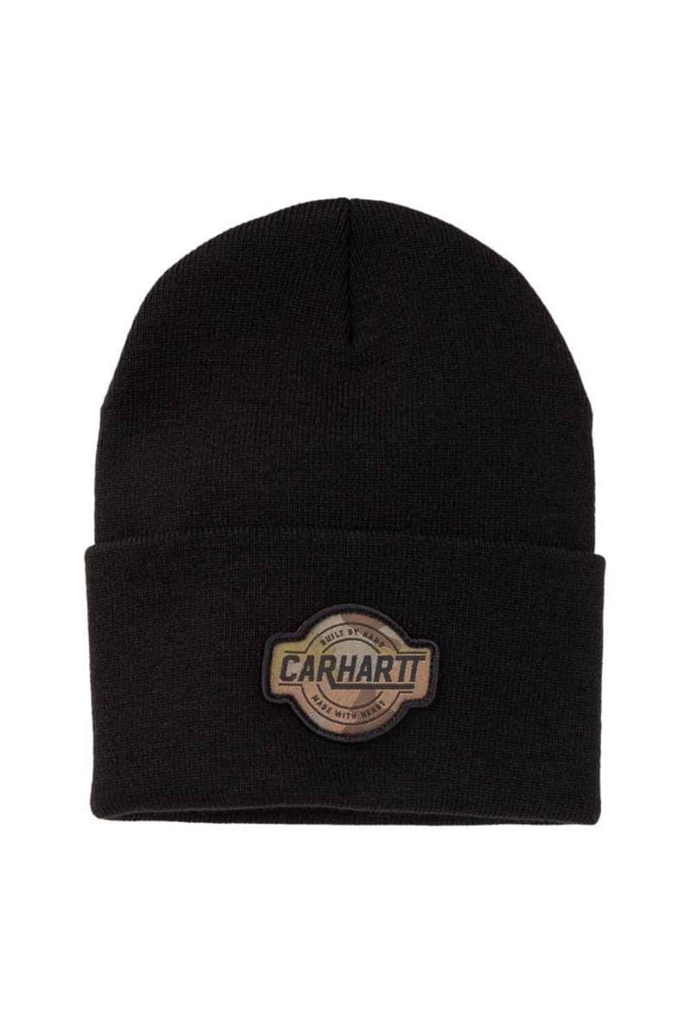 A black knit beanie hat featuring a circular brown and black Carhartt patch on the front cuff.