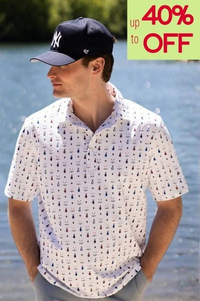 Man wearing a white polo with small golf print all over and a navy cap in front of a lake with a up to 40% off callout in the upper right corner of the photo