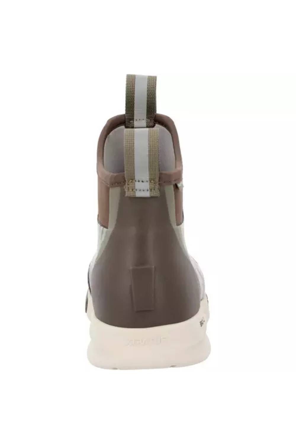 A single mid-height sneaker shown from the back, featuring a dark brown leather upper, a light brown suede ankle panel, a gray and white striped pull tab, and a thick off-white sole.