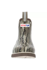 A single Xtratuf rubber rain boot shown from the back, featuring a camouflage pattern in shades of gray, brown, and green, with a white and gray pull tab and a red and blue Xtratuf logo on the back collar.
