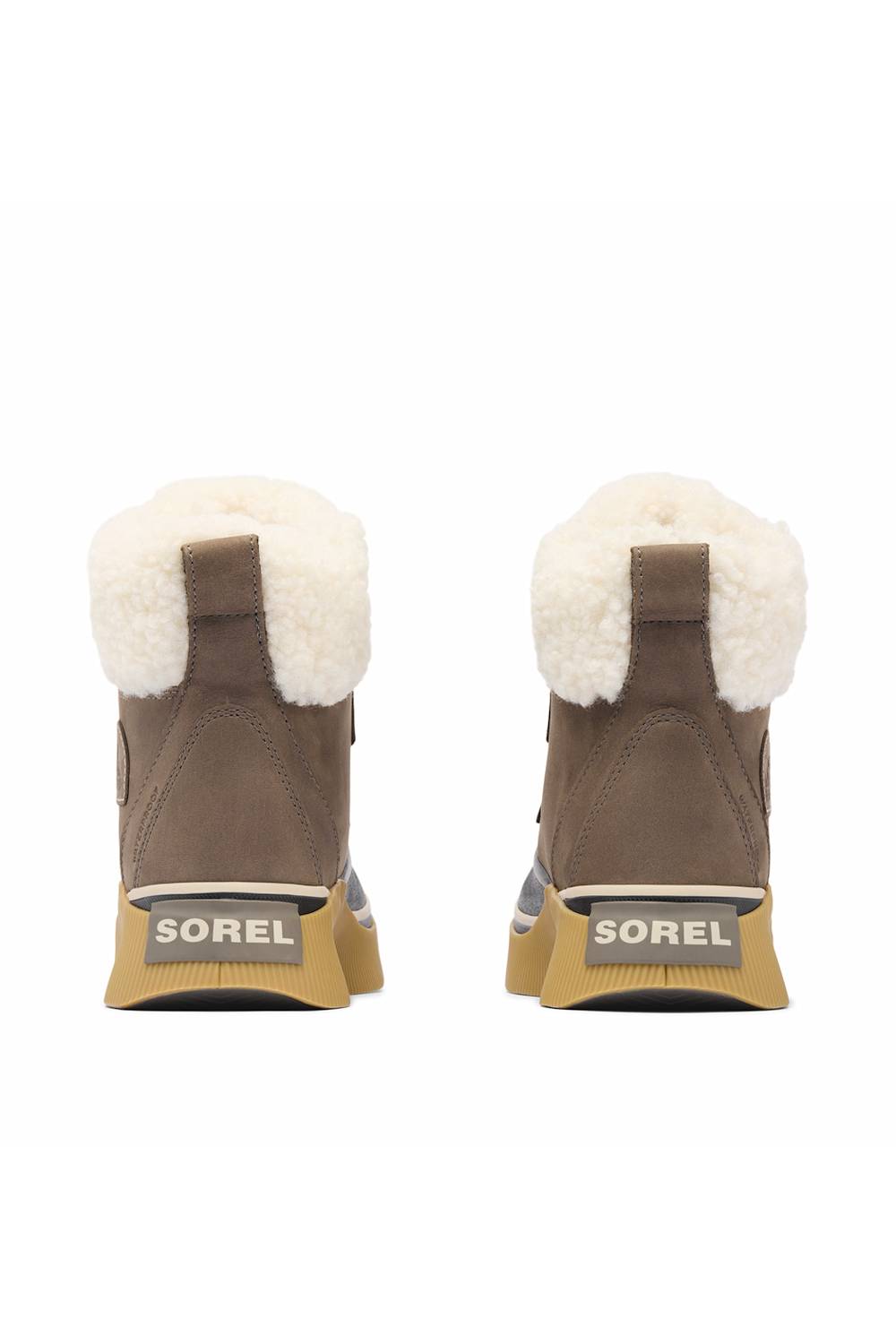 A pair of Sorel boots shown from the back, featuring a brown suede upper, white shearling lining, and a tan and gray sole with the SOREL brand name clearly visible.