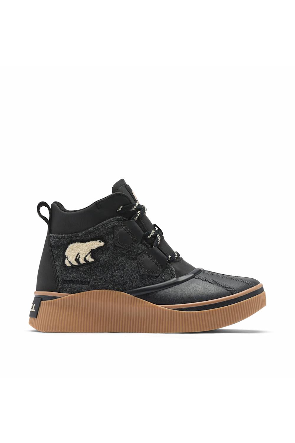 SOREL ONA black boot in profile, highlighting the side logo, ankle-height silhouette, and contrasting brown sole.