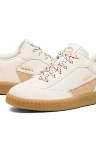 A pair of Sorel low-top sneakers in off-white and beige with tan laces and a gum sole, shown on a clean white background.