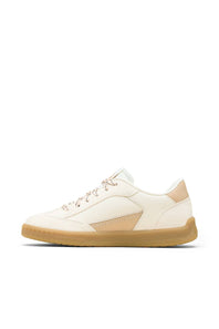 A pair of low-top sneakers in off-white leather with beige side panels, tan gum soles, and metallic rose-gold patterned laces, shown on a clean white background.