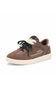 A brown suede and leather low-top sneaker by  featuring black laces, a cream-colored tongue detail, and a cream midsole and outsole.