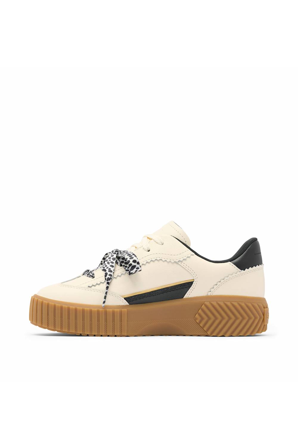 A low-top platform sneaker in off-white leather with a thick brown gum sole, black heel tab, and a black-and-white patterned laces detail.
