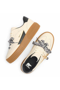 A pair of cream-colored platform sneakers with black and white leopard-print laces, black side accents, and brown gum soles, shown from a top-down view on a white background.