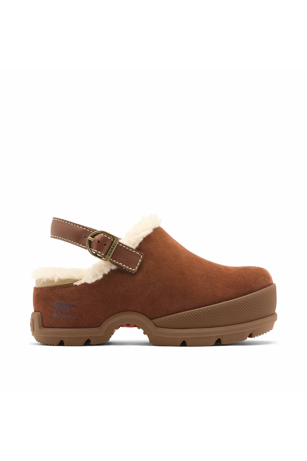 A brown suede clog shoe with a white shearling lining and a brown strap with a gold buckle, shown from the side on a white background.
