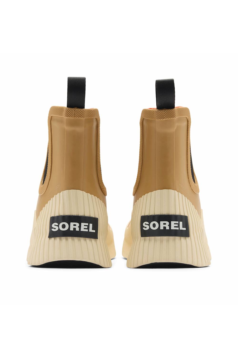 A pair of Sorel ankle boots shown from the back, featuring tan elastic side panels, cream ribbed midsoles, and black pull tabs with Sorel branding on the heel.