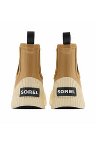 A pair of Sorel ankle boots shown from the back, featuring tan elastic side panels, cream ribbed midsoles, and black pull tabs with Sorel branding on the heel.