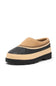 A slip-on clog-style shoe with a tan suede upper, a black rubber toe cap, a beige midsole stripe, and a black outsole, shown on a plain white background.