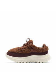 A pair of brown fuzzy lace-up sneakers with dark brown suede-like panels and thick off-white rubber soles, shown on a clean white background.
