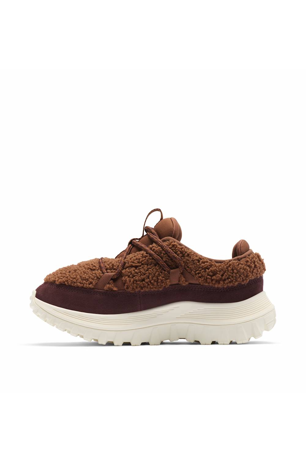 A pair of brown fuzzy lace-up sneakers with dark brown suede-like panels and thick off-white rubber soles, shown on a clean white background.